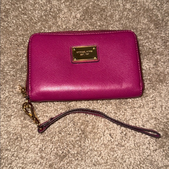 Michael Kors Handbags - Michael Kors Fuchsia Wristlet with Gold Accents